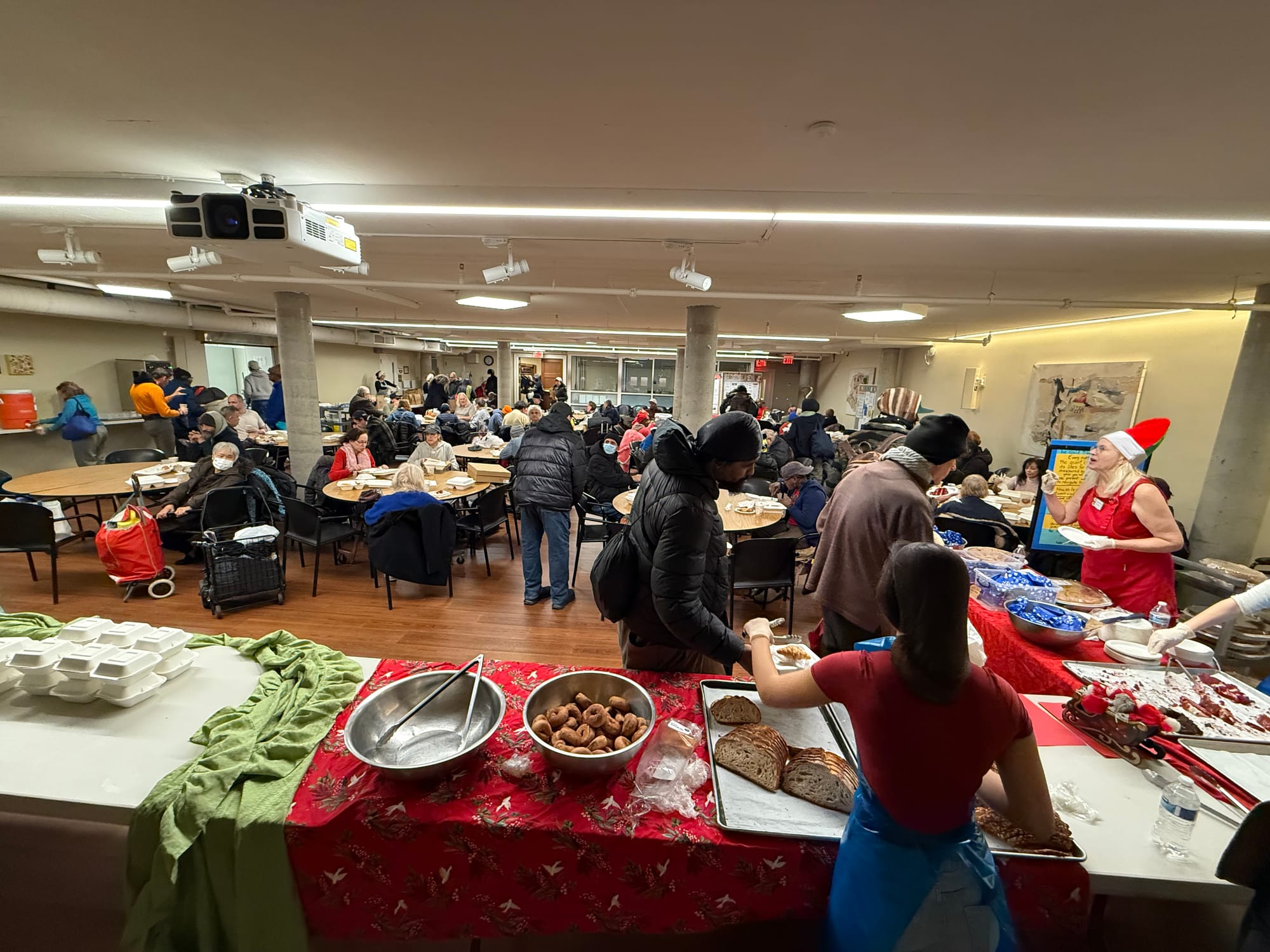 Wednesday Night Dinner volunteers serving neighbors